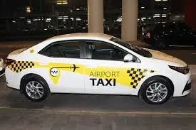 a taxi with writings airport taxi at trivandrum