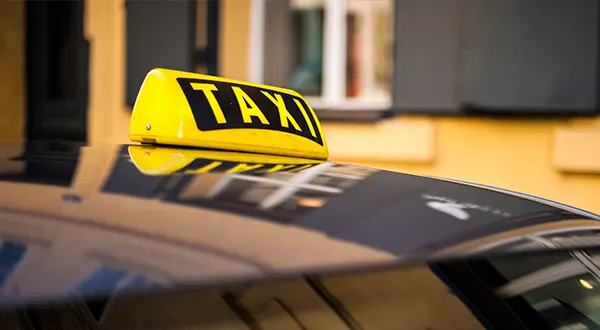 a yellow taxi in trivandrum